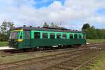 Railbus 554.10 stands at Mariembourg with the CFV3V on a sunny 23 September 2023.