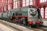 The NMBS 1002  Superpacific  at Antwerpen Centraal for the celebration of 100 years NMBS.
35 of these steam locs were build in 1935 by Consortium Belge de constructeurs de locomotives (Cockerill-Tubize-Haine Saint Pierre-La Meuse), max speed: 140km/h, power: 3200pk, 4-5-2, weight: 209 ton. Out of service in 1962. The loc was towed from the CFV3V museum at Treignes all the way to Antwerpen Centraal at a speed of 20 to 30km/h. Antwerpen Centraal 10-10-2026