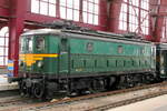 The NMBS 101.012 at Antwerpen Centraal for the celebration of 100 years NMBS. Type 101 the first electric locomotives of the NMBS. A total of 20 of these freight train locs were build in 1949 by Baume et Marpent SA. B'B , Max speed: 100km/h, Power: 1620kW, Power supply: 3000V, Traction force: 196kN, Weight: 81,5 ton, Length: 12,89m.  Antwerpen Centraal 10-10-2026