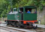 . The steam engine Tubize 2069  Helena  photographed in the station Dorinne-Durnal on the heritage railway track Le Chemin de Fer du Bocq on August 17th, 2013.