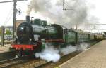 64.169 (the dot is correct) with steam train at Mons on a less-than-sunny 12 September 2009.