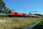 CrossRail DE 6314 hauls a cereals train through Tilburg Oude Warande on 24 June 2020.