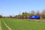 Locomotive 186 269 from Crossrail Belgium hauling the GTS train from Zeebrugge to Aachen-West, is passing in Sint-Martens-Voeren, 12/4/2025