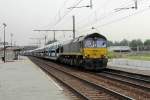 Ascendos PB 20 speeds through Antwerpen-Noorderdokken on 22 August 2013 with an automotive train from Sloe in the Netherlands.
