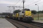SNCB 7855 leaves the Antwerp docks area and passes through Antwerpen-Noorderdokken on 22 August 2013.