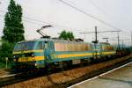NMBS 2734 with sister amnd iron ore train passes through Antwerpen Dam on 15 May 2002.