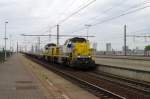 NMBS 7826 speeds through Antwerpen-Luchtbal on 21 May 2014.