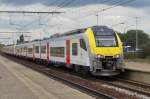 NMBS 08 140 calls at Antwerpen-Luchtbal on 19 June 2014.