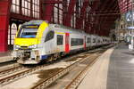 The NMBS 08129 as S34 Antwerpen Centraal to Dendermonde at platform 1, level +1 at Antwerpen Centraal.  
NMBS Class MR08 (EMU08) Desiro ML : A total of 305 of these EMU (Electric Multi Unit) were build between 2011 and 2016. The first 105 by Siemens, the last 200 by Bombardier. Numbers: 08001 to 08210 and 08501 to 08595. Number of carriages: 3. Length: 79,90m. Number of seats: 280. Max speed: 160km/h. Power supply: n� 08001 to 08210: 3000V , n� 08501 to 8595: 3000V en 25kV. Antwerpen Centraal. 24-10-2026