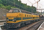 Engineering train with 6274 passes slowly through Liége-Guillemins on 22 July 1994.