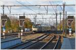 . HLE 1872 with M 6 cars is leaving the station of Brugge on November 23rd, 2013.