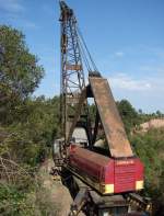 Crane at the site of a derailment above Curitiba