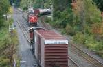 The short freight train with SD75I 5671 passes an other freight train which comes from west with C44-9W 2560, SD75I 5774 and SD40-2 6200 on 30.09.2009 at Bayview Junction near Hamilton.