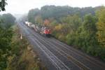 Freight train with two Dash-9 C44-9W 2671 + 2668 in the early morning fog on 03.10.2009 at Bayview Junction near Hamilton.