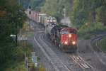 Freight train with CN SD70I 5607 and BC-Rail(CN) Dash-9 C44-9W  4646 on 03.10.2009 at Bayview Junction near Hamilton. 
