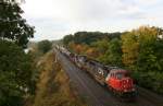 Freight train with CN SD70I 5607 and BC-Rail(CN) Dash-9 C44-9W 4646 on 03.10.2009 at Bayview Junction near Hamilton.