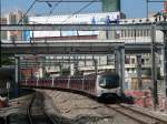 A train of the Kowloon-Canton Railway arriving in Hung Hom.