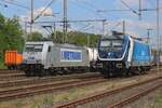 Två tjeckiska TRAXX vid Bad Bentheim den 26 april 2025: medan CDC 388 019 fördriver tiden i solen, drar Metrans 386 029 ett intermodalt tåg från Praha-Uhrineves ut ur Bad Bentheim