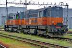 AWT 740 460 hauls a sister engine through Ostrava hl.n. on 4 June 2016.