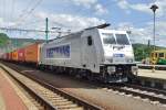 Metrans 386 017 rides smoothly through Decin hl.n. on 22 May 2015.