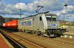 Metrans 386 016 passes through Decin hl.n. on 6 April 2017.