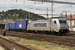 Metrans 386 002 hauls a container train through Bratislava hl.st. on 29 May 2015.