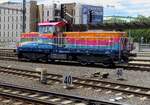 Unique liveried 714 217 (for the Cyklohrad bycycle trains) runs round at Praha hl.n. on 12 June 2022.