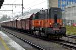 AWT coal train with 740 819 defies the pouring rain in Ostrava hl.n.