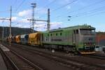 KDS 751 115 hauls a maintenance train through Decin hl.n. on 27 May 2025.
