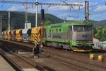 KDS 751 115 hauls a maintenance train through Decin hl.n. on 27 May 2025.