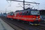 Dark and rainy, 7 April 2017 was at Decin hl.n. with IDS 121 084 passing by.