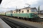 CD 130 036 with sister and coal train in tow waits at Koln on 13 May 2012.