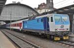 CD 163 054 stands at Praha hl.n. on 24 May 2015.