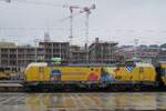 On 16 May 2018 Regiojet 193 226 stands at Praha hl.n. and catches the rain -the irony therein being the fact, that the loco advertises for a Czech swimming pool recreation park.