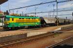 PSZ 242 282 hauls a cereals train through Bratislava hl.st. on 2 June 2015.