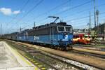 CD Cargo 363 504 hauls a mixed freight through Zilina on 25 August 2021.