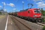 DBC 193 330 hauls a tank train through Köln Messe/Deutz on 16 May 2025.