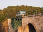 Diesel locomotive 810 on the bridge near the village Cista at at 4.9.2012.