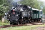 On 10 June 2022, ex-CSD 354.195 pushes an extra train back into the railway museum of Luzna u Rakovnika.