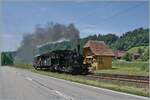 With an Emmental Railway steam train traveling to Wasen i. E., the E 3/3 853 (UIC 90 85 0008 573-3) reaches the Oberei stop; a stop on request. Although the line is no longer served by scheduled passenger trains, the station building remains in opera ...
