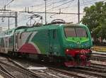 Lok E 464 901 pulls its train out of the station in Ferrara onto a siding. May 8th, 2025