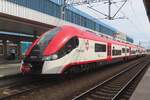 EN76-033 calls at Poznan Glowny on 3 May 2024. EMU Classes EN76 and EN96 belong both to the ELF range, that is imediately recognisable by the black 'smile'at the cab from the windows. 