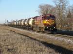 C36-7 1513 with empty oil-cans near Lagedi