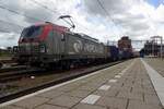 On 25 May 2021 PKP Cargo EU46-514 hauls the Chengdu container shuttle through Amersfoort, where she will take a break for about 15 minutes. From 2022 all PKP Cargo Vectrons have traded their red-pinkisch cab portions for blue.