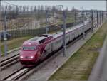 The PBA Thalys unit 4534 is running on the high speed track in Lage Zwaluwe on March 10th, 2011.