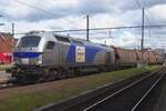 On 5 May 2023 EuroPorte 4014 hauls a cereals train through Gent Sint-Pieters.