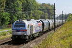 Europorte 4013 med ett spannmålståg från Frankrike på väg till hamnen i Antwerpen. Vossloh-Stadler Euro4000 byggd 2012 med konstruktionsnummer 2637. Linje 27A vid Antwerpen flygplats. 26-08-2026