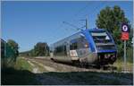 The SNCF X 73767 is the TER 895714 from Pontarlier (dp 11:28) to Dole-Vile (arr 12:45) and is leaving La Rivière-Drugeon.
