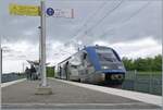 The SNCF X 73755 is operating as a TER from Belfort to Delle and is waiting in Meroux for the opposing train.