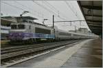 The SNCF BB 22394 with a long TER to Lyon in Dijon. 
22.05.2012